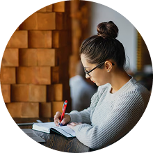 A girl is writing something