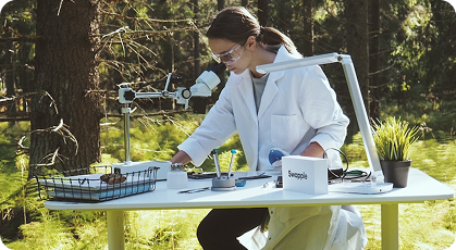 Student conducting environmental field research outdoorsScience