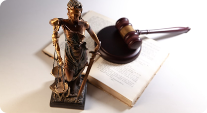 Judge's gavel resting on legal documents