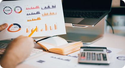 Calculator, notebook, and charts representing mathematics study